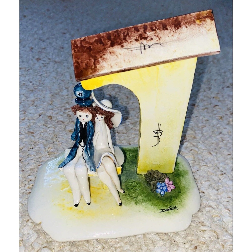 Zampiva Italy Porcelain Spaghetti Hair Figurine Couple Sitting In The Bench.